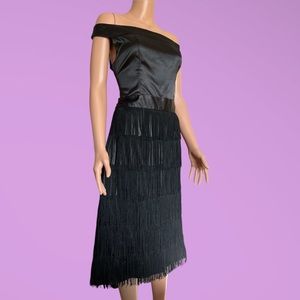 Black Fringe Shimmy Dress in great condition features satin-like fabric